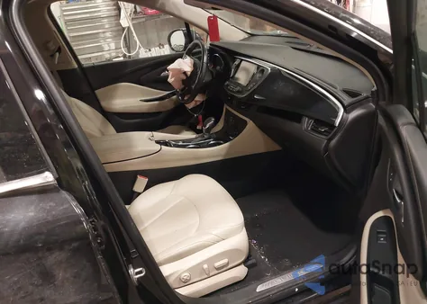 2018 Buick Envision Essence z USA, uszkodzony, nr VIN LRBFX2SA6JD018339